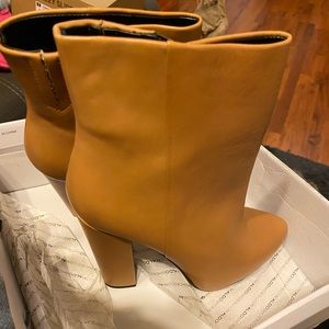 Tan booties zip up  thick heel ( Aldo booties ) comfy … never worn No tags